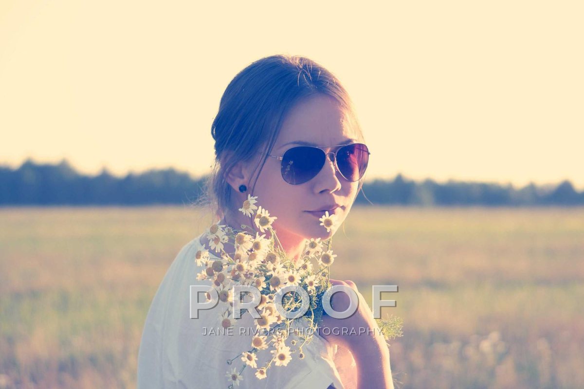 The same photo with the PROOF mark lower down, across the flowers and her shoulders