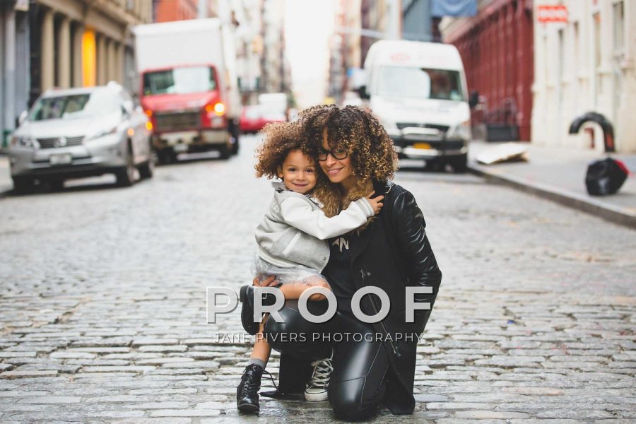 The family photo with a PROOF mark at 70% opacity, strong and bright