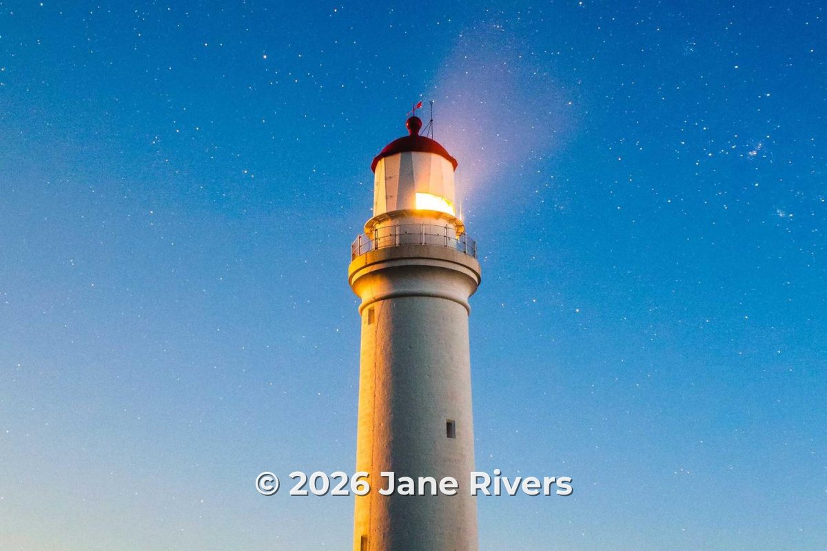 A lighthouse under a starry sky with the copyright notice © 2026 Jane Rivers along the bottom