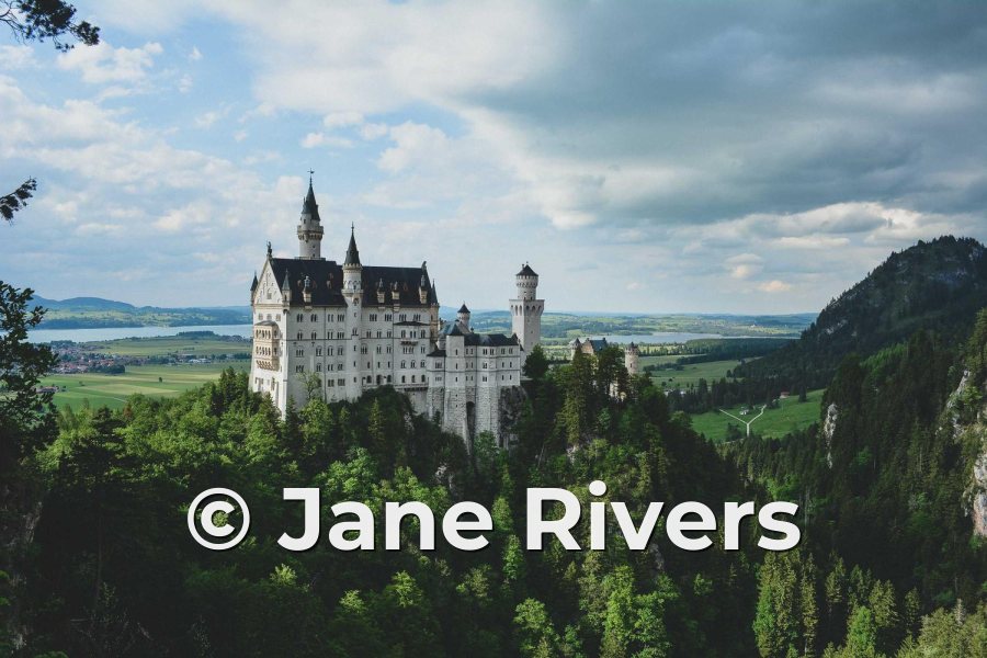 A castle in a green valley with the watermark © Jane Rivers