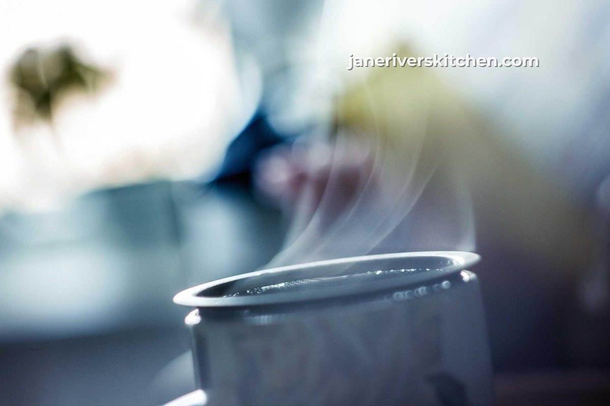 The same steaming cup with the blog website address as the watermark
