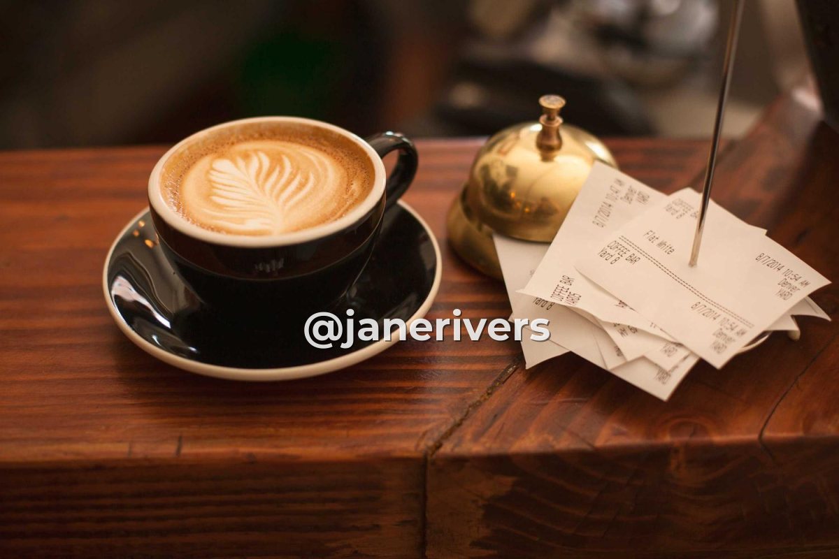The same coffee cup photo with a bold watermark reading @janerivers