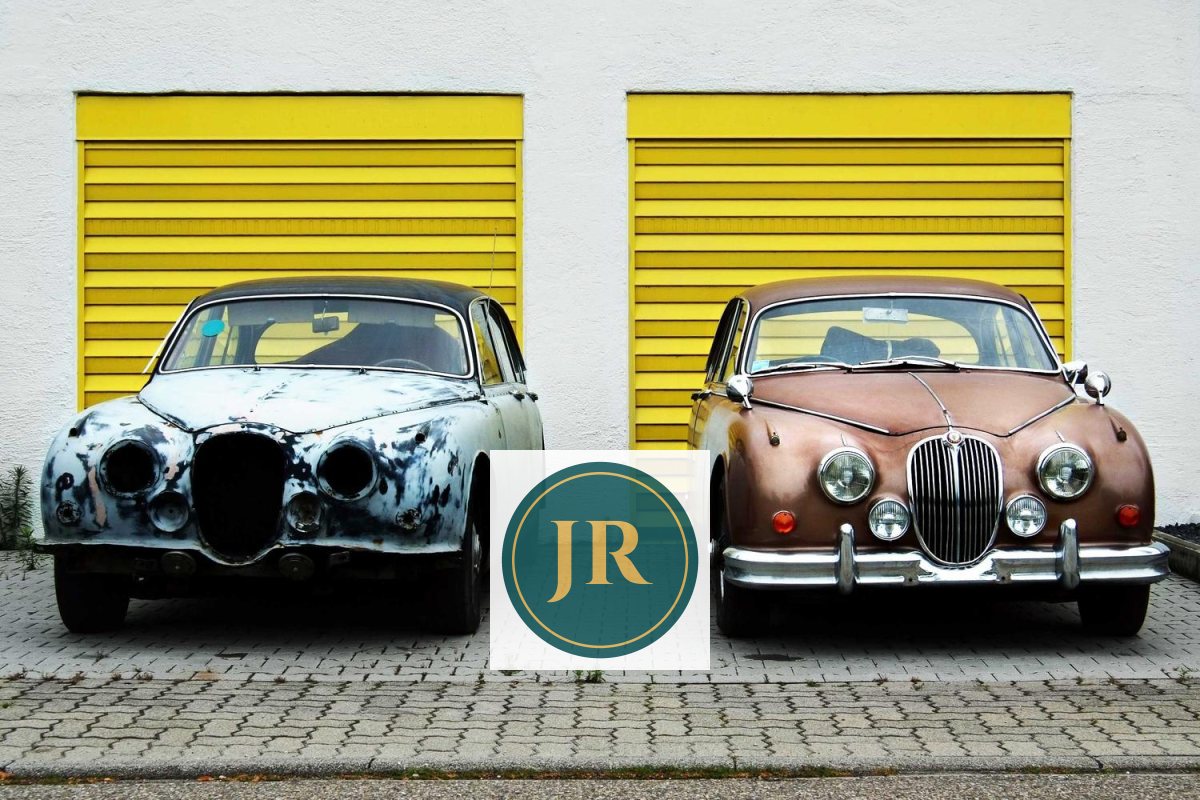 Two classic cars in front of yellow garage doors with a logo on a white square between them