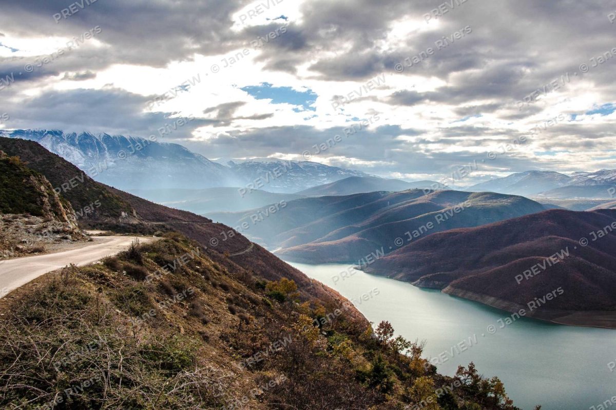 A mountain lake landscape covered with a faint tiled watermark reading PREVIEW and © Jane Rivers