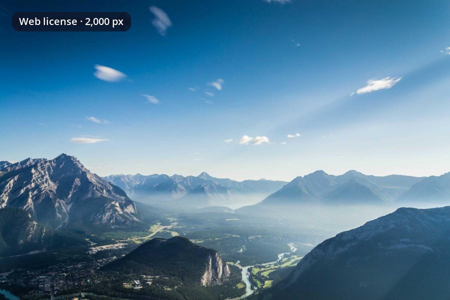 The same mountain valley photo labeled Web license, 2,000 px