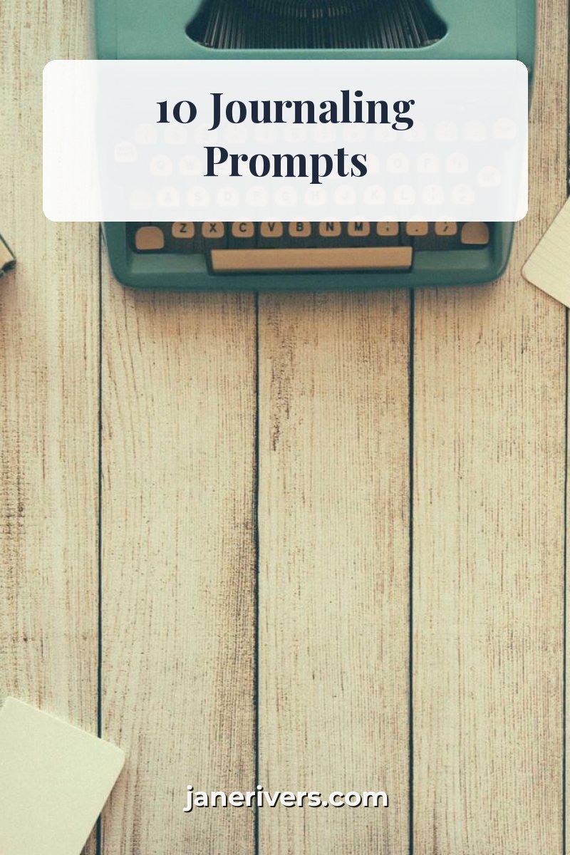 A typewriter pin with a 10 Journaling Prompts title band and janerivers.com at the bottom