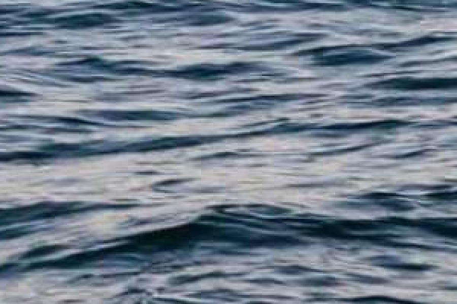 Enlarged crop of water saved at JPEG quality 60