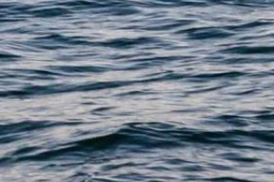 Enlarged crop of water saved at JPEG quality 80