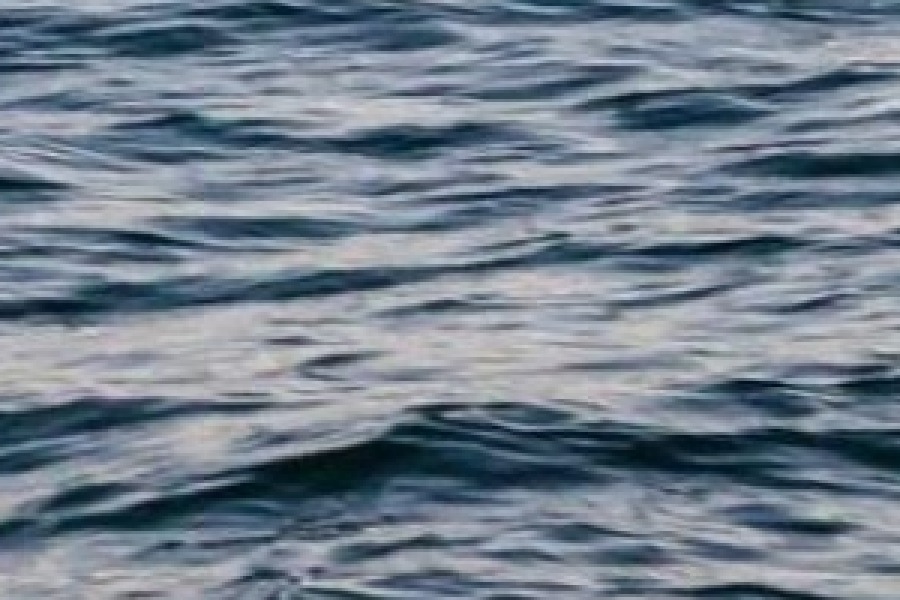 Enlarged crop of water saved at JPEG quality 95