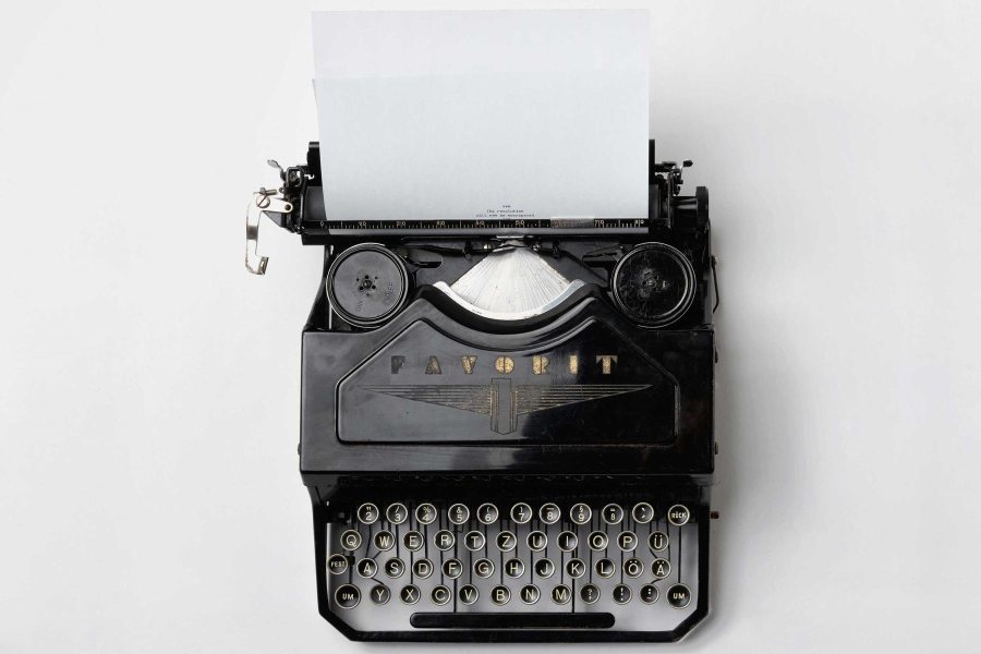 A typewriter on a plain white background with no watermark