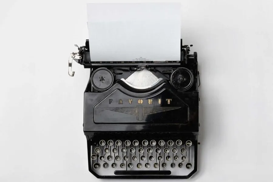 A typewriter on a plain white background with no watermark