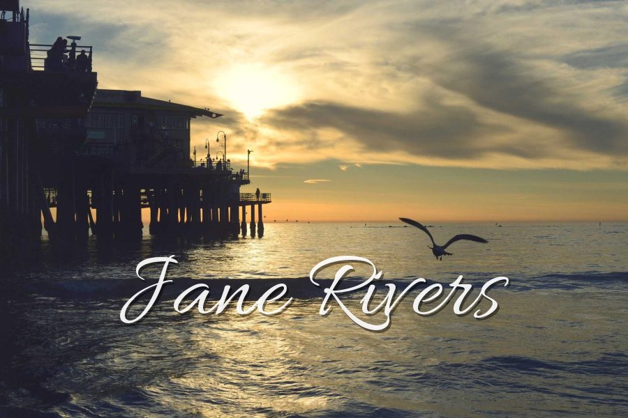 Jane Rivers in Allura, an elegant formal script, over a pier at sunset