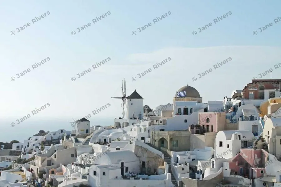 The same village with the tiled watermark at 25% opacity