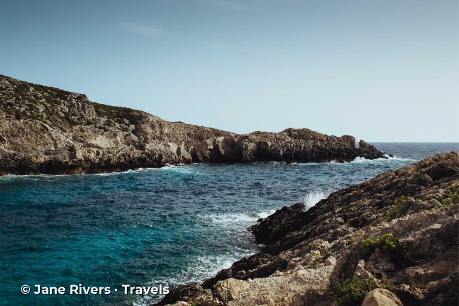 A rocky coastline with the watermark in the lower left