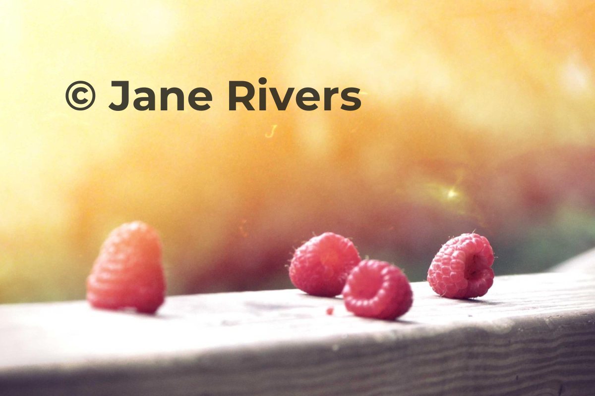 The same bright raspberry photo with a near-black watermark that is easy to read