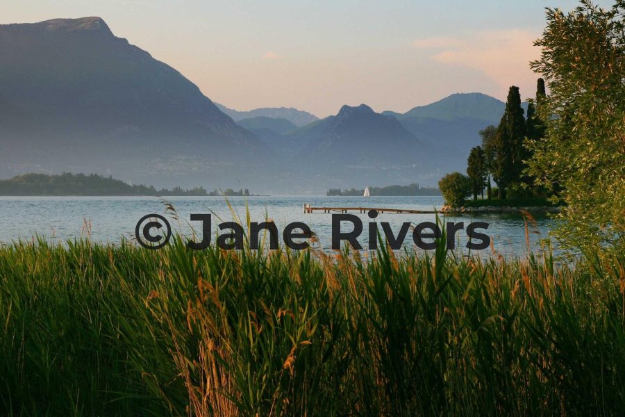 The same lake photo with a near-black watermark