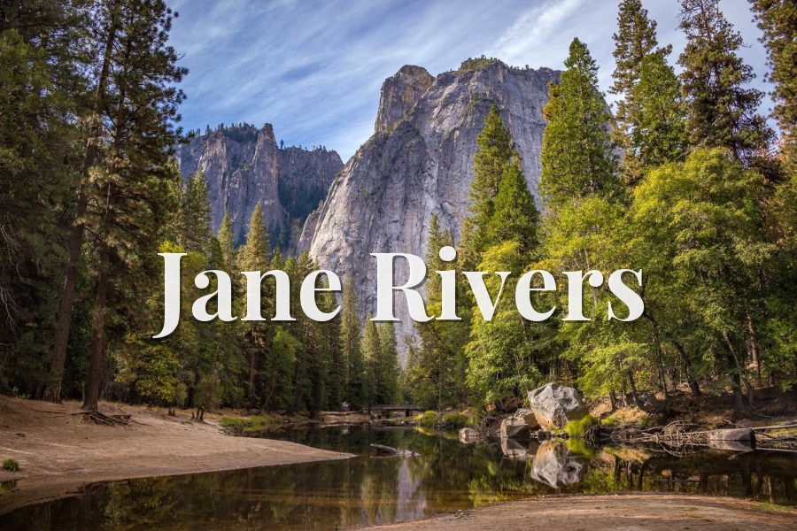 Jane Rivers watermark in Playfair Display Bold over a forest and granite cliff