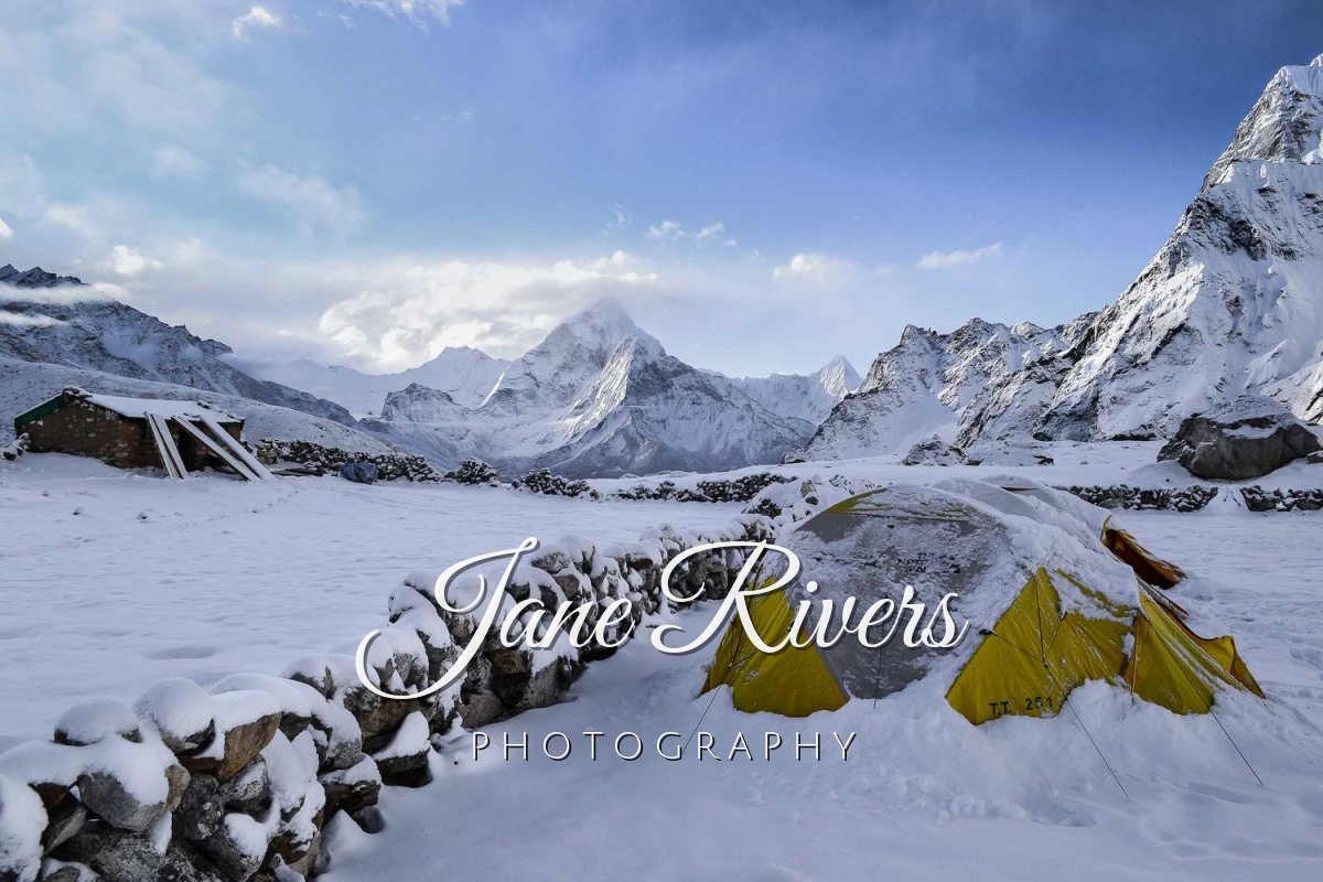 A snowy mountain camp with Jane Rivers in Great Vibes script and PHOTOGRAPHY in spaced capitals below
