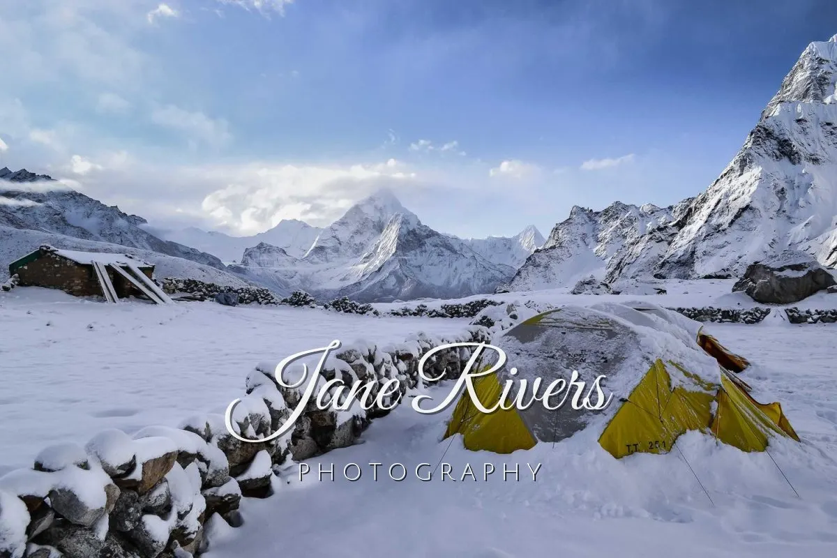 A snowy mountain camp with Jane Rivers in Great Vibes script and PHOTOGRAPHY in spaced capitals below