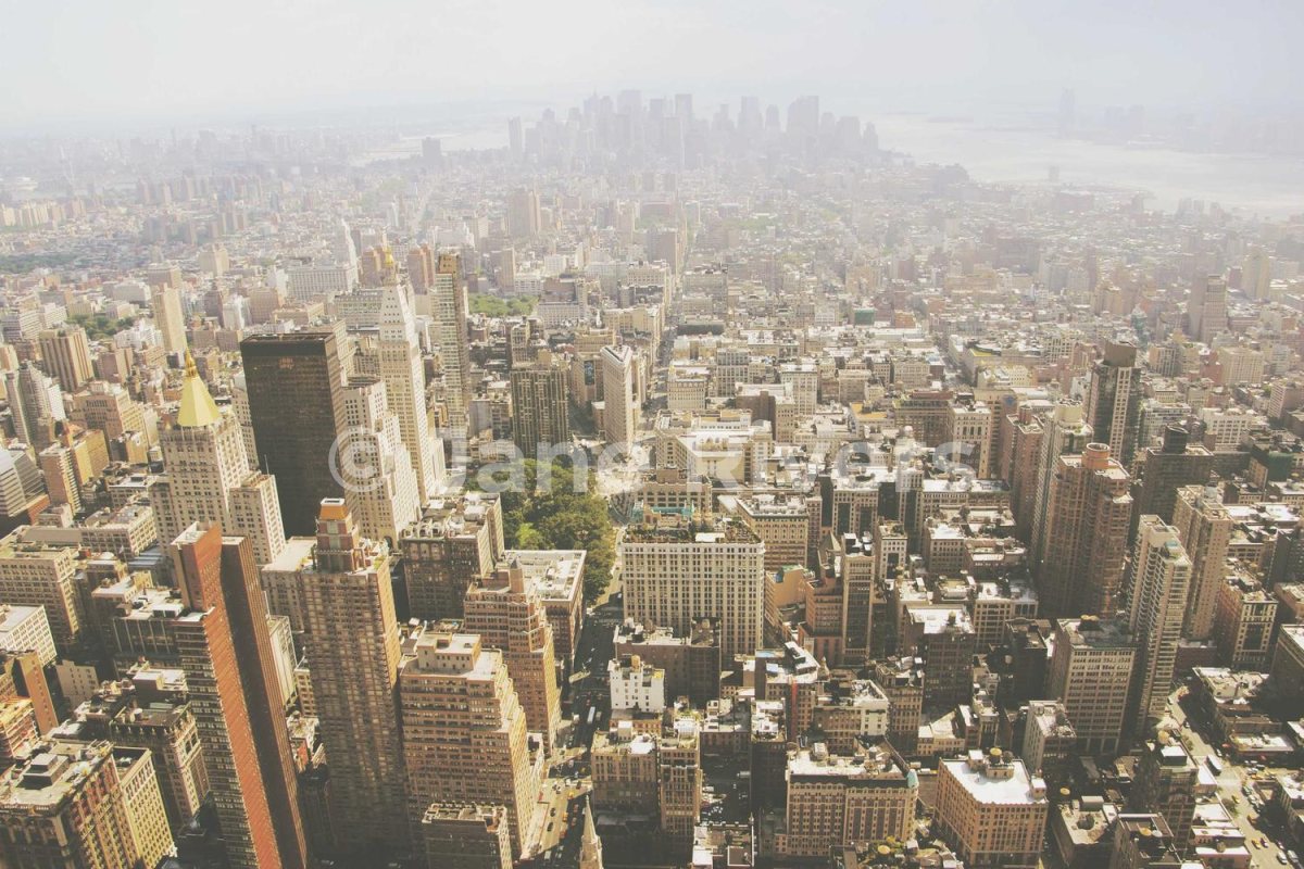 An aerial city photo with a 35% white watermark that blends into the buildings