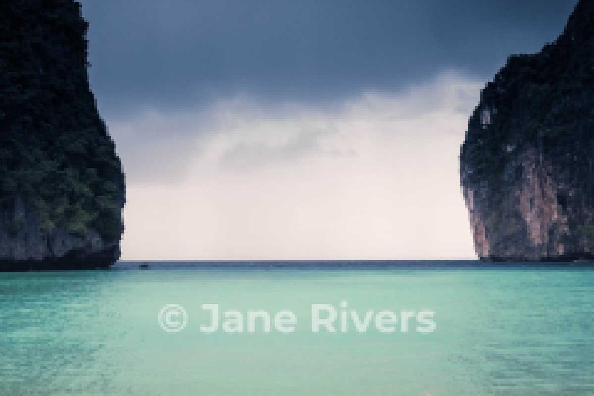The same beach photo shrunk to thumbnail size with a 50% watermark that is still readable