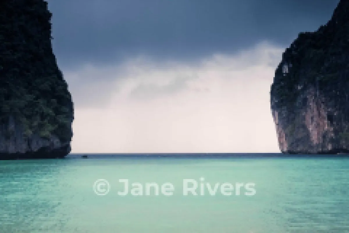 The same beach photo shrunk to thumbnail size with a 50% watermark that is still readable
