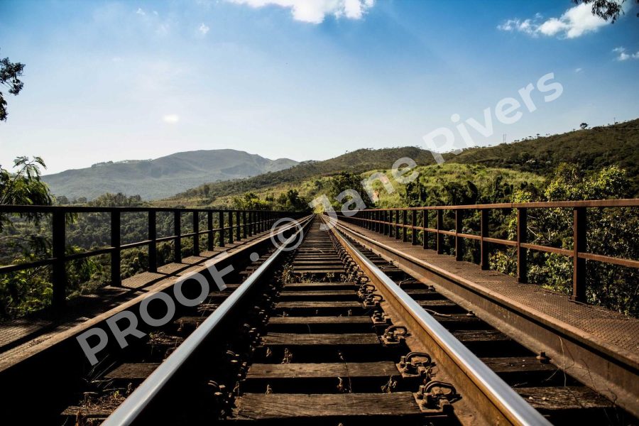 The same railway photo with a large diagonal PROOF watermark at 40% opacity