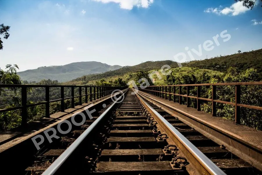 The same railway photo with a large diagonal PROOF watermark at 40% opacity