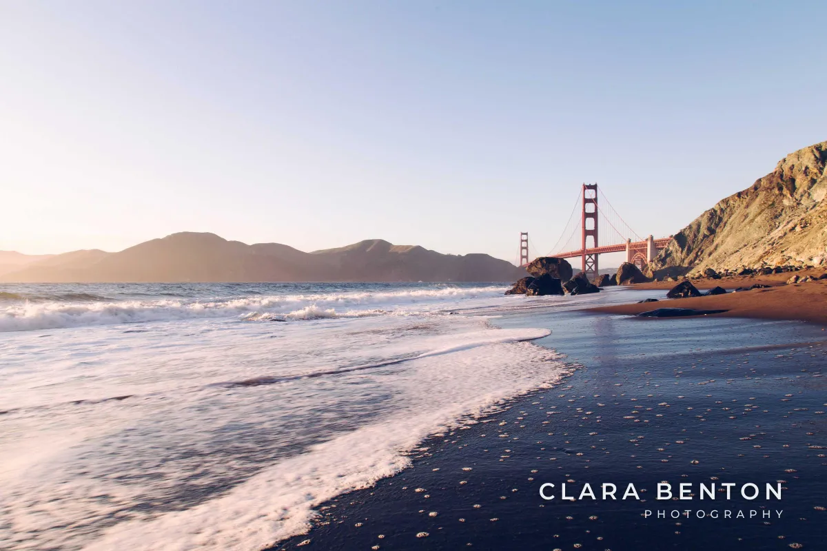 The same beach photo with CLARA BENTON in widely spaced capitals over a smaller PHOTOGRAPHY line, with a soft shadow