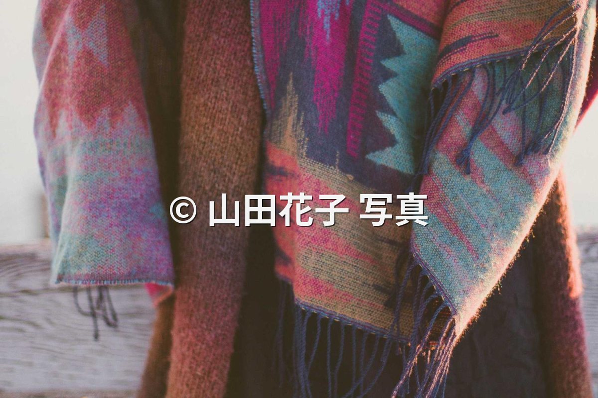 The same photo with the Japanese name rendered correctly in a font that supports it