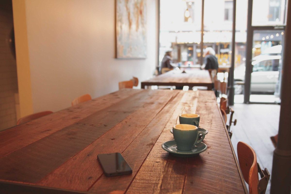 A table set by a window with no credit